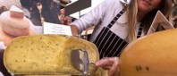 wheel of cheese being cut in Piedmont