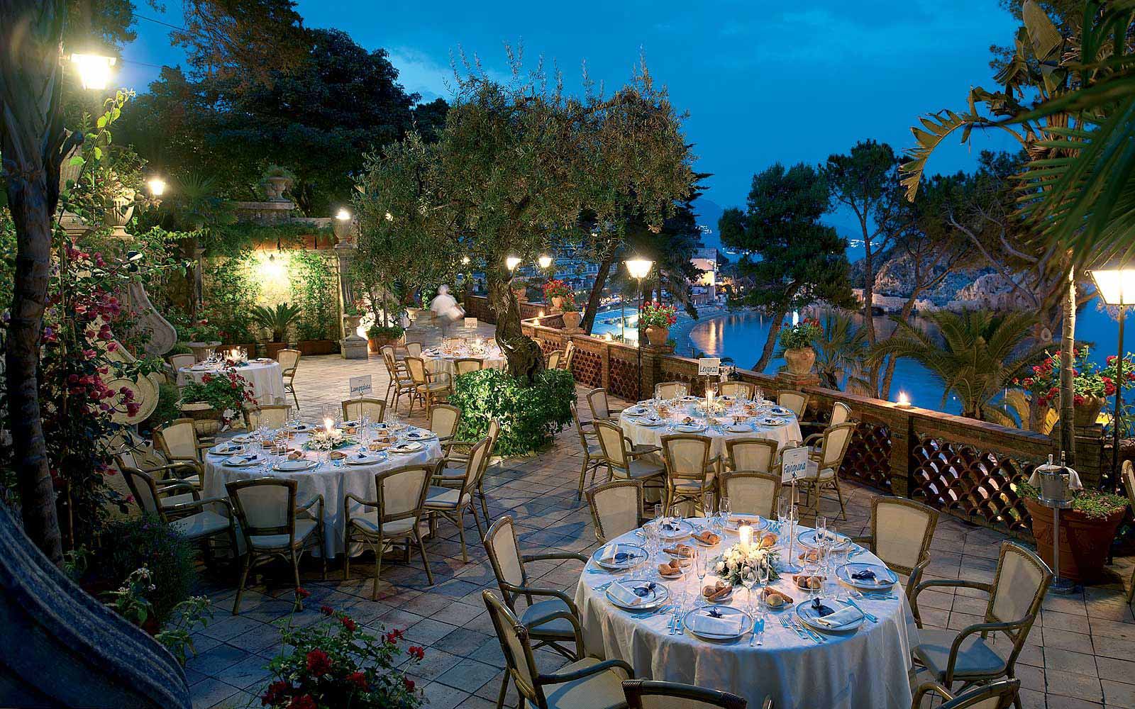 Banquet terrace at night at Belmond Villa Sant' Andrea
