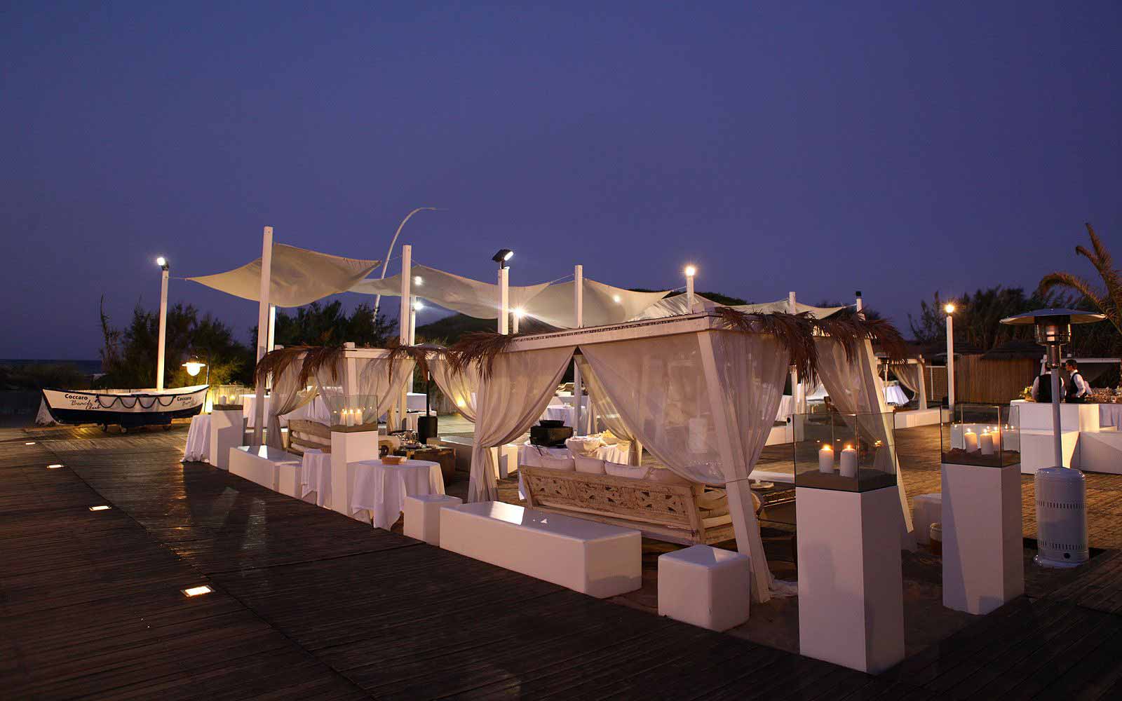 Outdoor lounge by the beach at Masseria Torre Coccaro