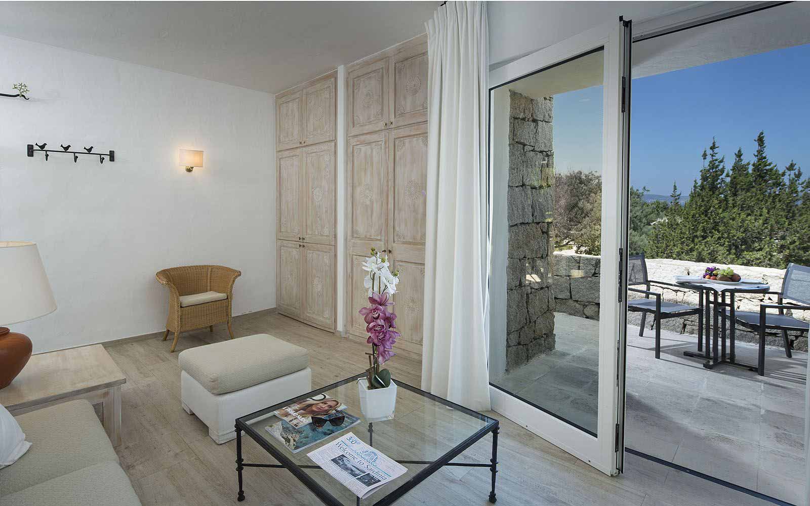 Junior Suite lounge area and patio at the Grand Relais dei Nuraghi