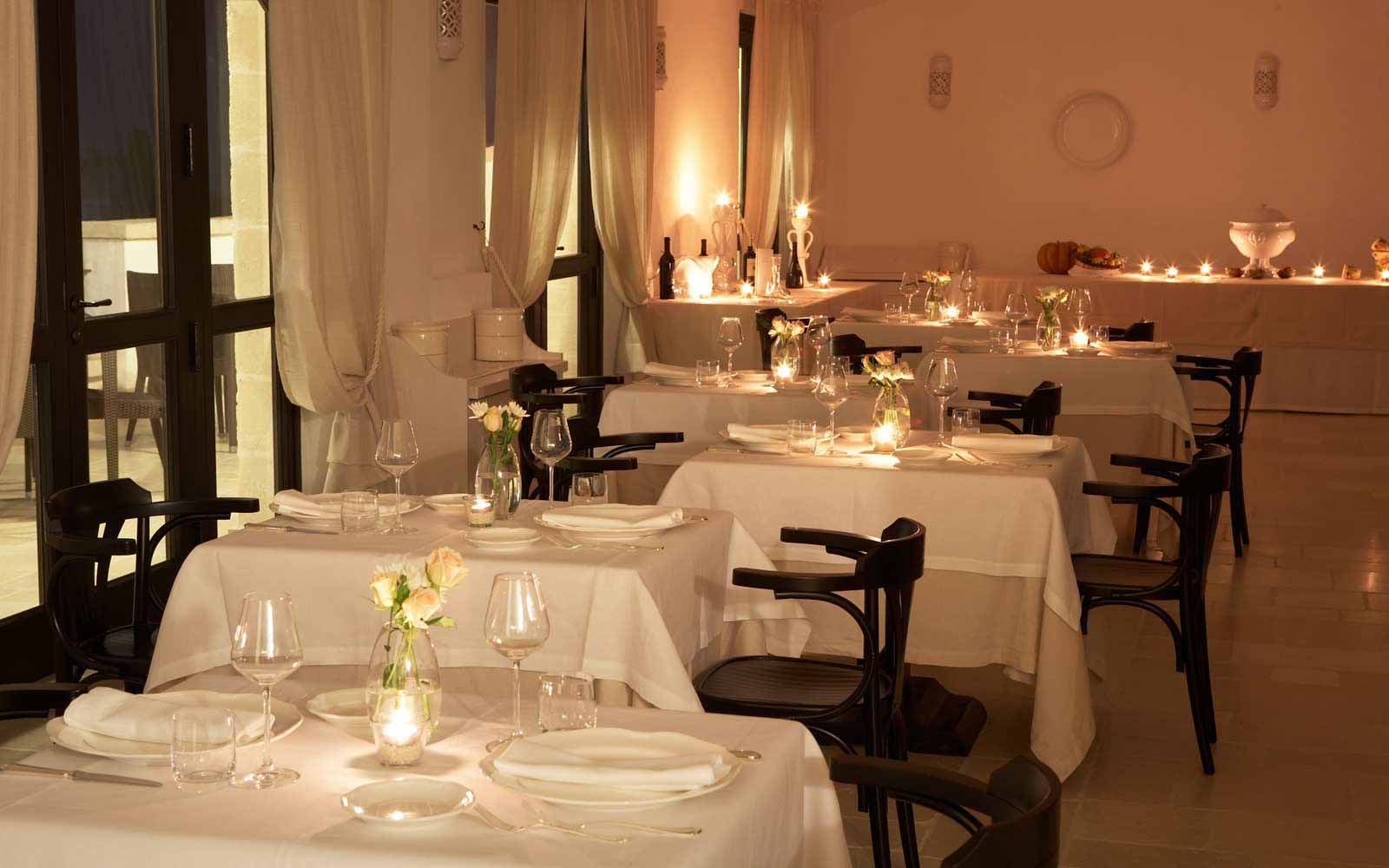 White restaurant at Borgobianco Resort & Spa